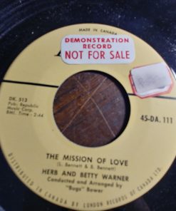 Herb & Betty Warner - The Mission Of Love / Put Your Bagpipe Down (7", Single) (Very Good Plus (VG+))