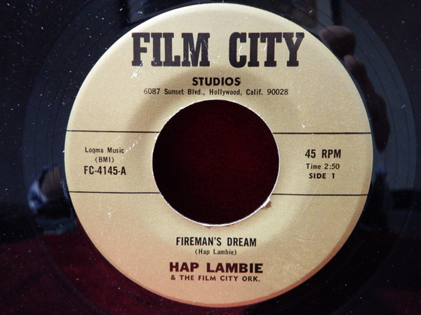 John 'Hap' Lambie And The Film City Orchestra - Fireman's Dream (7") (Very Good Plus (VG+))
