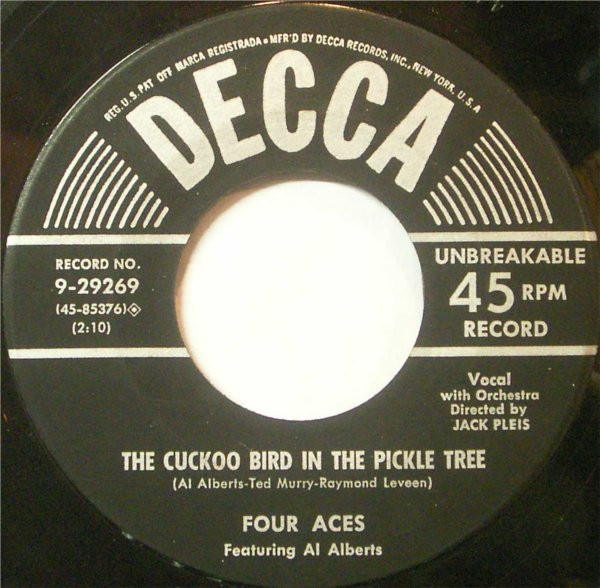 The Four Aces Featuring Al Alberts - It's A Woman's World / The Cuckoo Bird In The Pickle Tree (7", Single) (Near Mint (NM or M-))