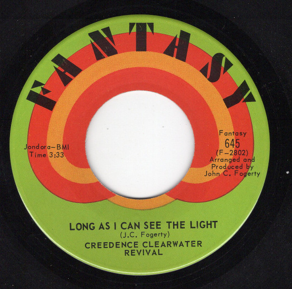 Creedence Clearwater Revival - Lookin' Out My Back Door (7", Single) (Near Mint (NM or M-))