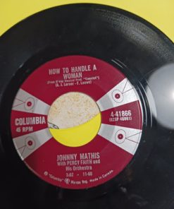 Johnny Mathis - While You're Young (7", Single) (Near Mint (NM or M-))
