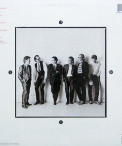 Alternative view of Huey Lewis & The News - Small World (LP, Album) (Mint (M))