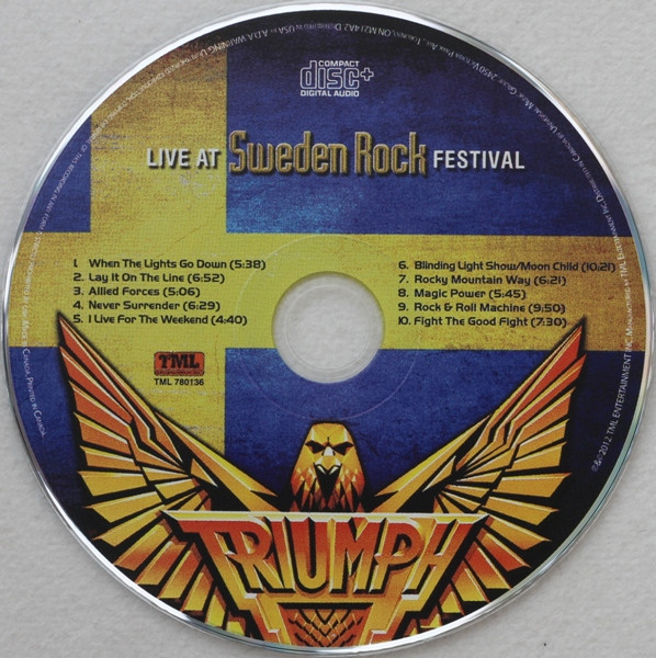 Triumph (2) - Live At Sweden Rock Festival (CD, Album + DVD) (Near Mint (NM or M-)) - Image 3