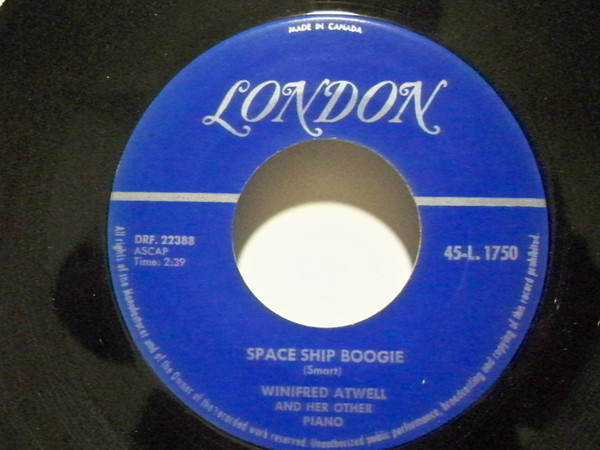 Winifred Atwell - Space Ship Boogie / Struttin' Down Jane Street (7", Single) (Very Good (VG))