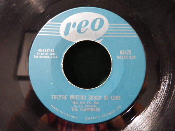 The Flamingos - (They're Writing Songs Of Love) But Not For Me / I Shed A Tear At Your Wedding (7", Single) (Very Good Plus (VG+)) - Image 2