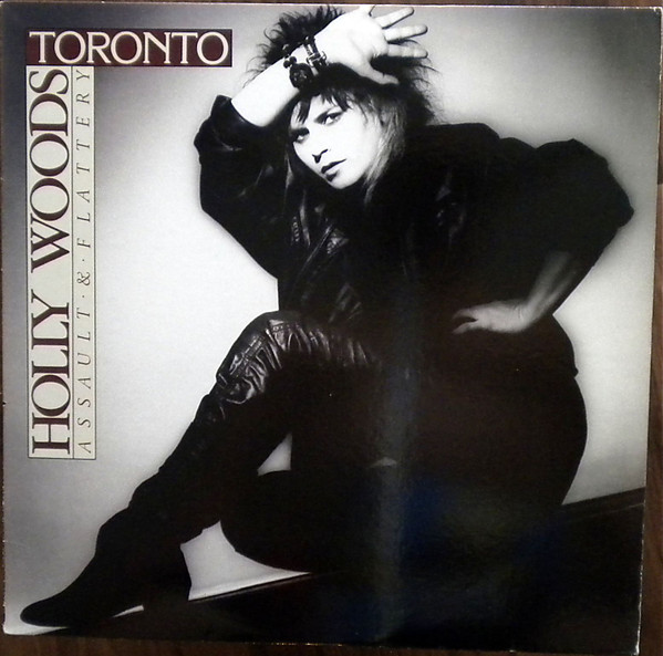 Holly Woods & Toronto (4) - Assault & Flattery (LP, Album) (Mint (M))