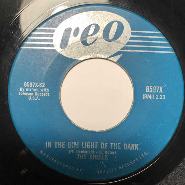 The Shells - O-Mi Yum-Mi Yum-Mi / In The Dim Light Of The Dark (7", Single) (Very Good Plus (VG+)) - Image 2