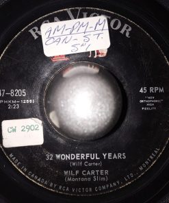 Alternative view of Wilf Carter - A Cashbox For A Heart / 32 Wonderful Years (7") (Very Good (VG))