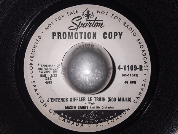 Maxim Saury Et Son Orchestre - Tu Es La (Turn Around, Look At Me / J'Entends Siffler Le Train (500 Miles) (7", Promo) (Very Good Plus (VG+)) - Image 2