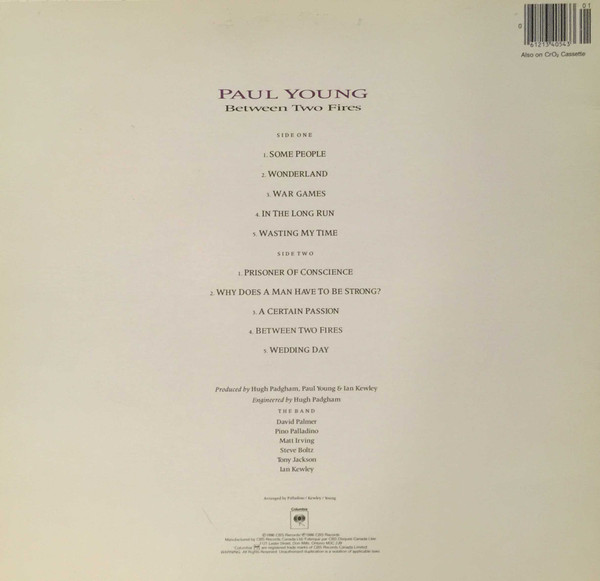 Paul Young - Between Two Fires (LP, Album) (Mint (M)) - Image 2