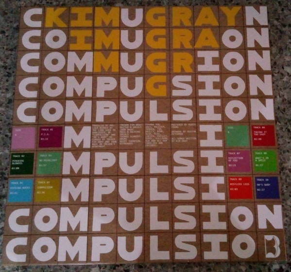 Kim Gray (2) - Compulsion (LP, Album) (Near Mint (NM or M-)) - Image 2
