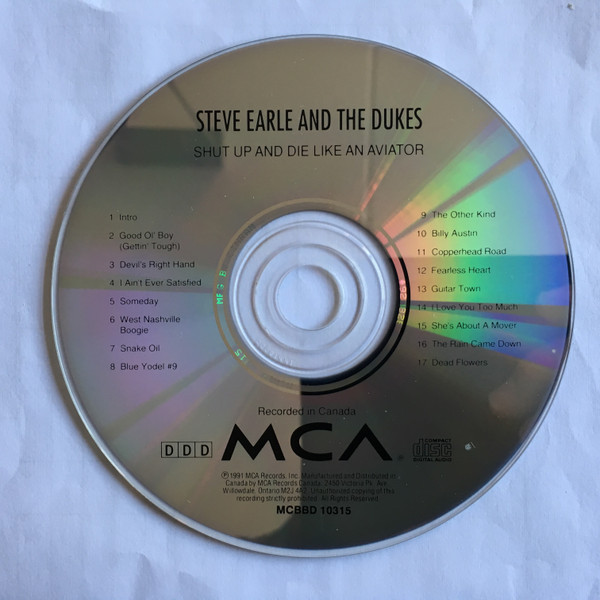 Steve Earle & The Dukes - Shut Up And Die Like An Aviator (CD, Album) (Near Mint (NM or M-)) - Image 3