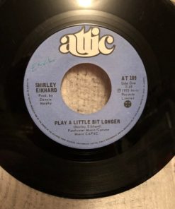 Shirley Eikhard - Play A Little Bit Longer (7", Single) (Near Mint (NM or M-))