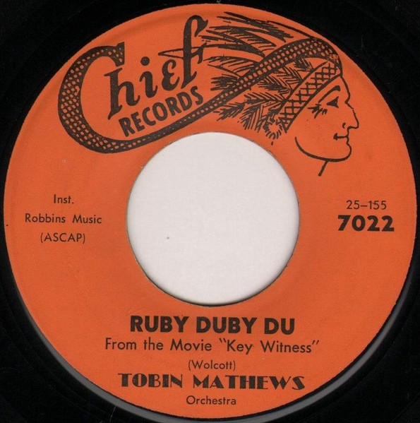 Tobin Matthews - Ruby Duby Du / Leatherjacket Cowboy (7", Ora) (Near Mint (NM or M-))