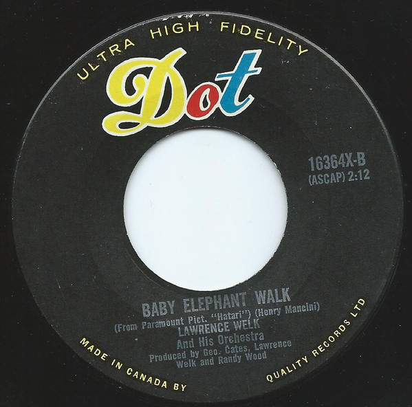 Lawrence Welk And His Orchestra - Theme From The Brothers Grimm / Baby Elephant Walk (7", Single) (Near Mint (NM or M-)) - Image 2