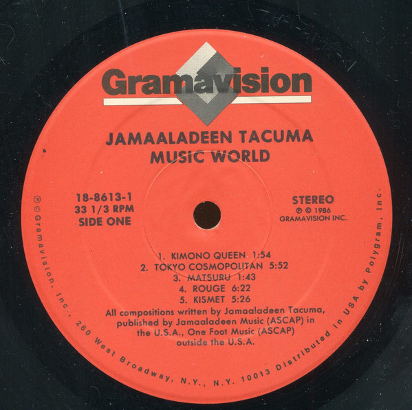 Jamaaladeen Tacuma - Music World (LP, Album) (Near Mint (NM or M-)) - Image 3